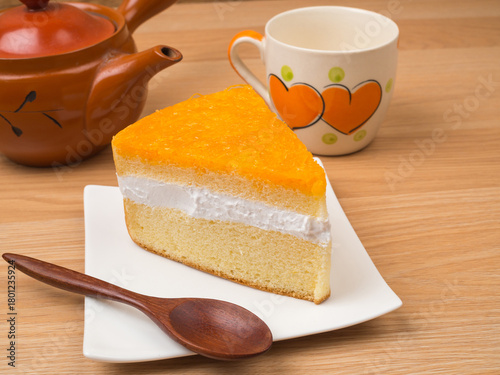 Slice of Thai Golden Thread Cake (Foy Thong Cake) on White Plate