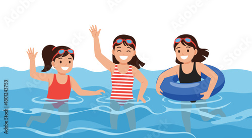 Three happy young girls in swimsuits and goggles are enjoying a fun summer day playing and swimming together in the water.