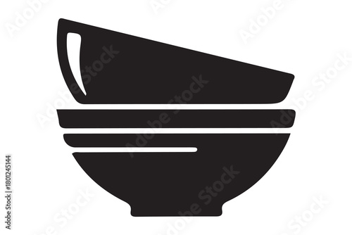 Two simple black ceramic bowls stacked neatly on top of each other isolated on white background