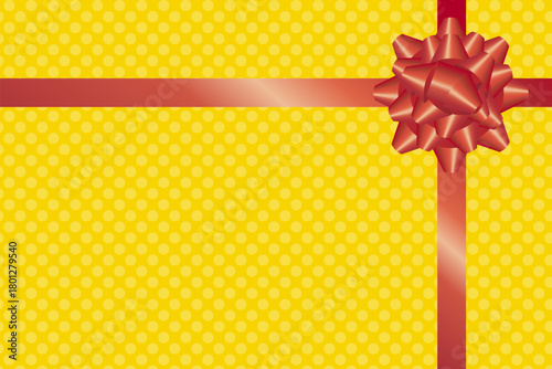 赤色のリボンの黄色の包み紙のギフトイメージ背景