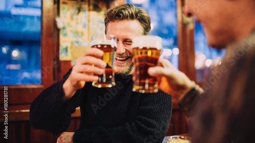 Cheers with beer mugs between friends at a cozy bar—warm tones, candid smiles and genuine social connection for hospitality brands, nightlife promos and weekend celebration themes