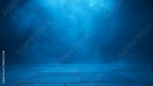 Dark Blue Abstract Background With Light Rays Shining Through Fog Onto Tiled Floor