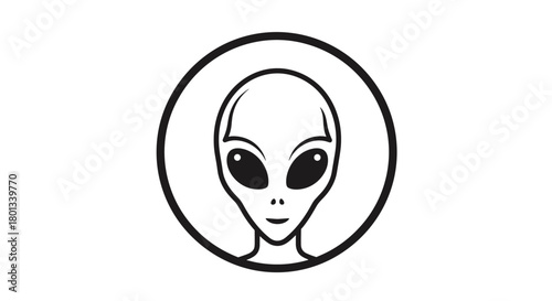 An iconic black and white vector graphic of a grey alien's head, featuring large dark eyes and a subtle smile, framed within a circular border.