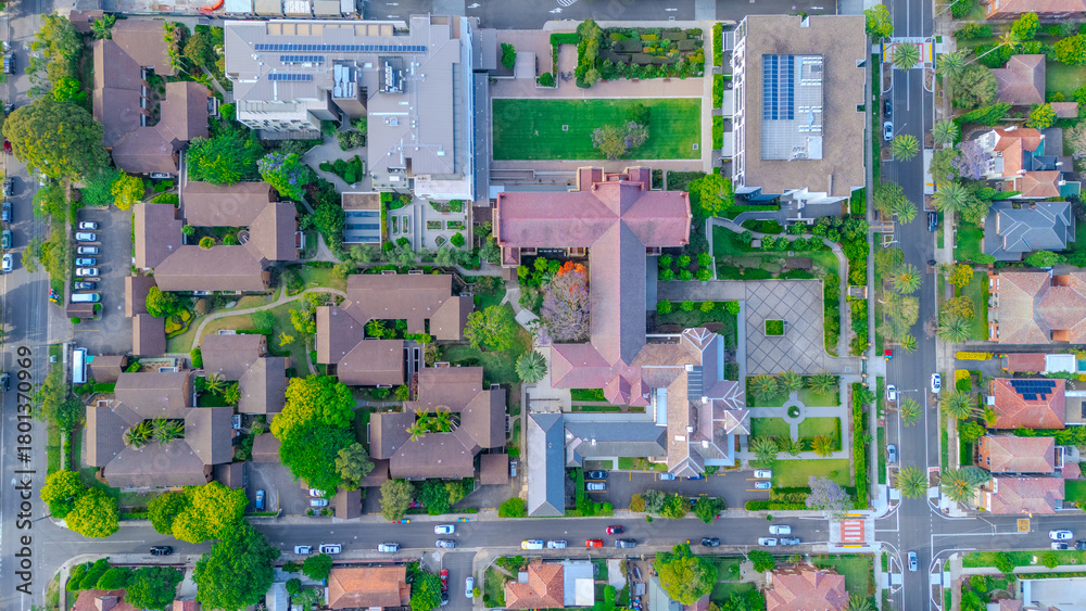 Naklejka premium Aerial Panorama Drone View of a inner western Sydney Suburb of Ashbury Urban Sprawl and the terracotta roof tops streets and trees of Suburban Sydney NSW Australia