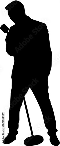 silhouette of a man stand singing