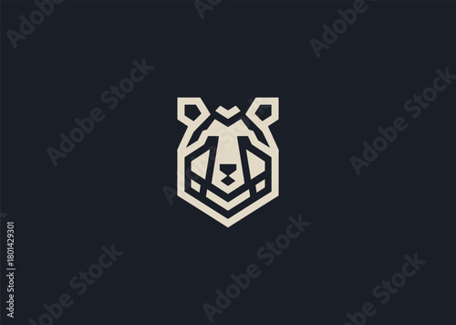 A modern geometric bear logo made with clean angular lines and strong symmetrical shapes, symbolizing power, stability, and confidence, designed as a bold creative vector concept