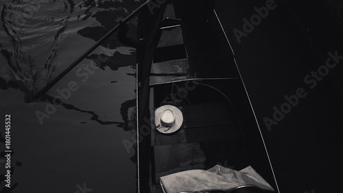 A detail of a Gondola and the gondolier's hat in venice