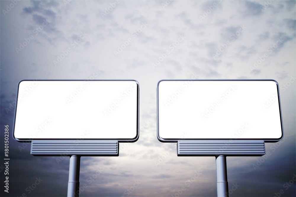 Obraz premium Two blank rectangular billboards with metallic frames against cloudy sky background for advertising or branding presentation template concept. 3D Rendering