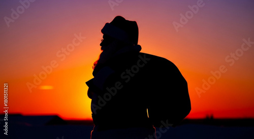 Silhouette of santa claus against a vibrant sunset, capturing the magic of christmas eve with a mysterious and festive atmosphere, creating a sense of wonder