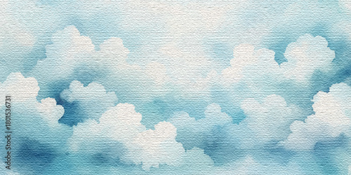 Bright blue sky background with fluffy white cumulus clouds on a sunny summer day