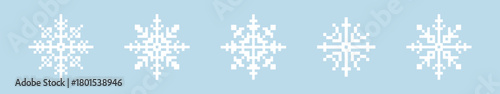Set of white pixelated snowflakes on a light blue background.