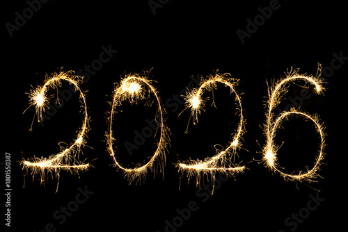 Happy New Year 2026 in sparkler font and firework