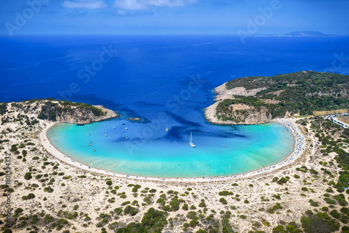 Fototapeta Naklejka Na Ścianę i Meble -  Panoramic aerial view of the popular Voidokilia beach in Messinia, Peloponnese, Greece, situated in a lgaoon with sand dunes and turquoise sea
