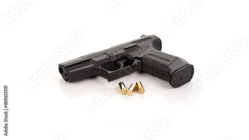 Black metal handgun and 9mm bullets isolated on white, symbolizing military and police firearm protectionBlack metal handgun and 9mm bullets isolated on white, symbolizing military and police firearm 