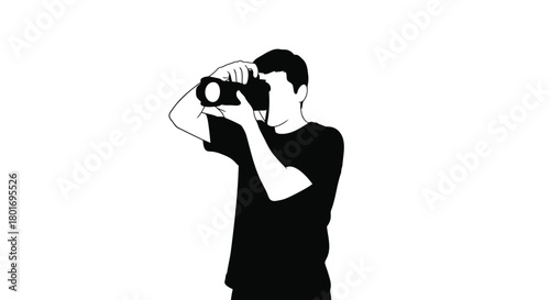 Silhouette of a person holding a vintage video camera and filming on a white background