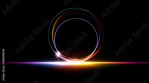 黒背景に輝く虹色の多重光円
