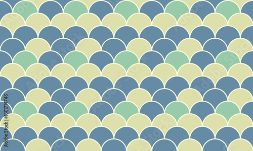 Elegant seamless pattern featuring a captivating fish scale design in muted pastel blues and greens.