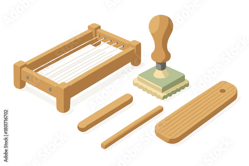 Traditional wooden tools for making fresh Italian pasta like chitarra and ravioli stamp