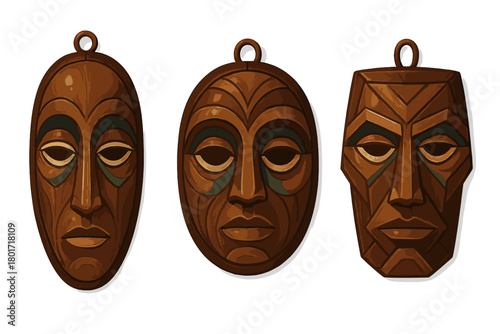 Traditional wooden tribal masks with carved details and decorative paint on white background