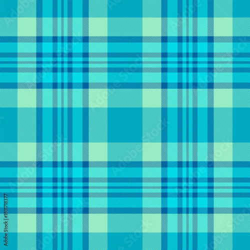 Classic blue plaid pattern. Seamless tartan design for textile, fabric, or backgrounds. Versatile for traditional and modern applications.