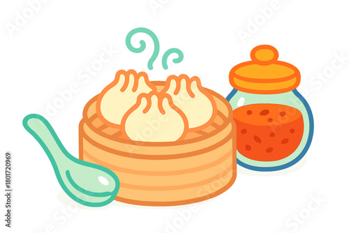 Steaming soup dumplings in bamboo basket with dipping sauce and spoon