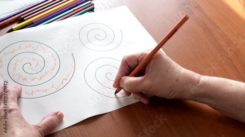 Parkinson Spiral Motor Control Test Performed by Senior Woman