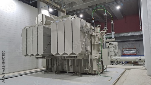 industrial power transformer installation in electrical substation interior