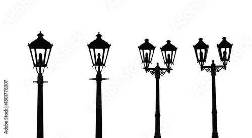 Silhouette of four different street lamps