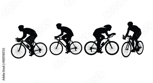 Silhouette of four cyclists
