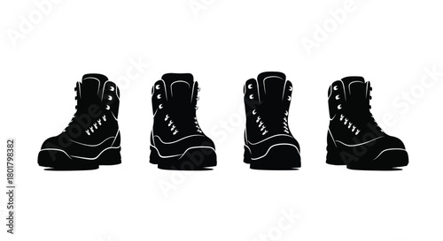 Four black work boots for industrial work