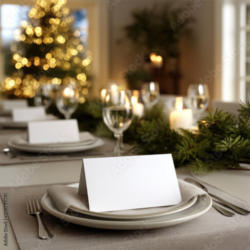 Elegant Christmas dining table with blank place cards, festive candlelight, evergreen garland, and sparkling tree in cozy holiday atmosphere