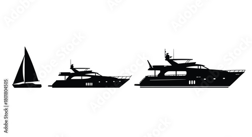 Silhouette of sailboat and motor yacht