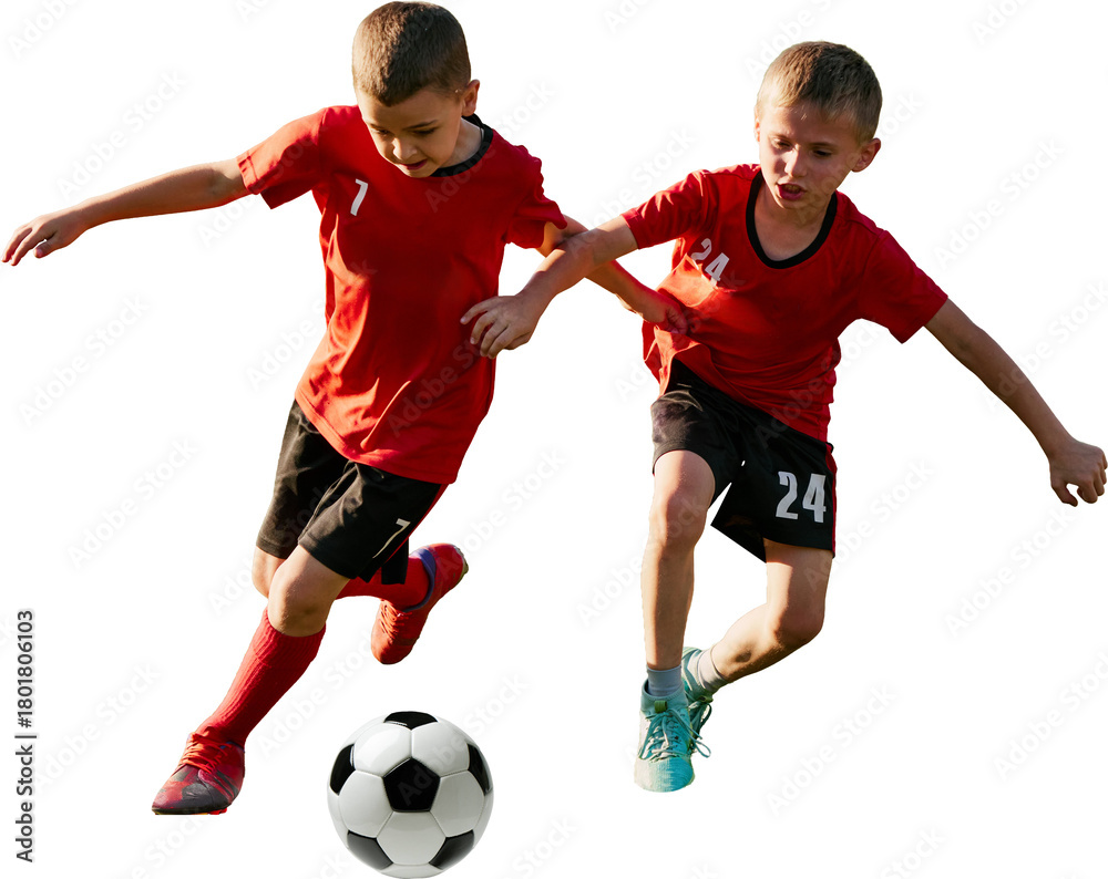 Fototapeta premium Young football players competing for ball on transparent background. Concept of youth league visuals, teamwork education, grassroots training, school sports promo.