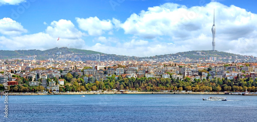 Fototapeta Naklejka Na Ścianę i Meble -  Panorama of Istanbul with Bosphorus Strait. The futuristic Kucuk Camlica TV Radio Tower stands tall on the eastern side of Istambul.