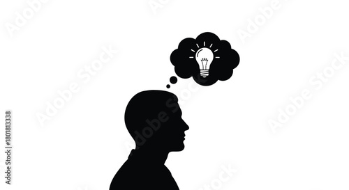 Silhouette of a person s head with a glowing light bulb in a thought bubble symbolizing a new idea