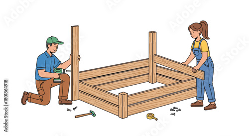 Happy couple building a wooden garden bed together, enjoying DIY project and home improvement in their yard