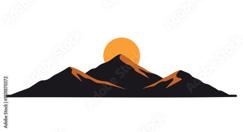 Silhouette of rugged mountain peaks against a vibrant orange sun at sunset or sunrise