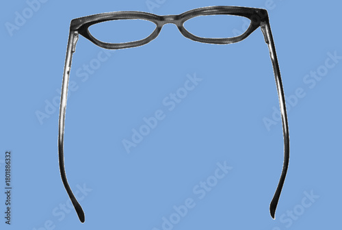 close up of eyeglasses frame pixelate grayscale color halftone dotted texture style collage element isolated on blue background	