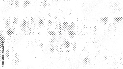 Abstract grayscale halftone dot pattern with scattered irregular shapes and varying density background