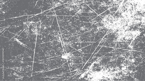 Abstract distressed grunge texture background with white scratches and speckles on dark gray surface