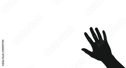 Silhouette of a human hand reaching out against a stark white background with copy space