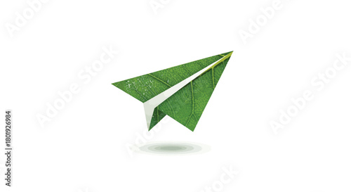 Green paper airplane made from recycled paper flying against a clean white background with subtle shadow