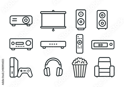 Home theater elements including projector, speakers, console, headphones, remote, and armchair