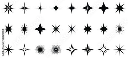 Collection of abstract starburst shapes and sparkling light effects in black and white
