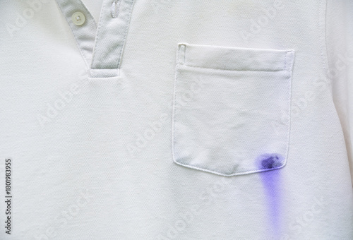 blue ink dirty stain  on white shirt for cleaning concept idea in work house