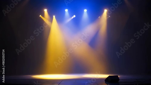 Empty Stage With Yellow And Blue Spotlights Illuminated By Stage Lighting Equipment Creating Dramatic Atmosphere In A Dark Concert Hall