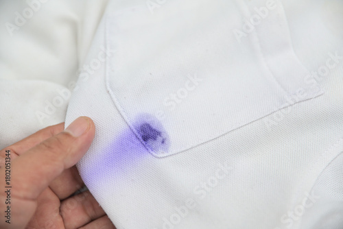 blue blue ink dirty stain  on white shirt for cleaning concept idea in work house