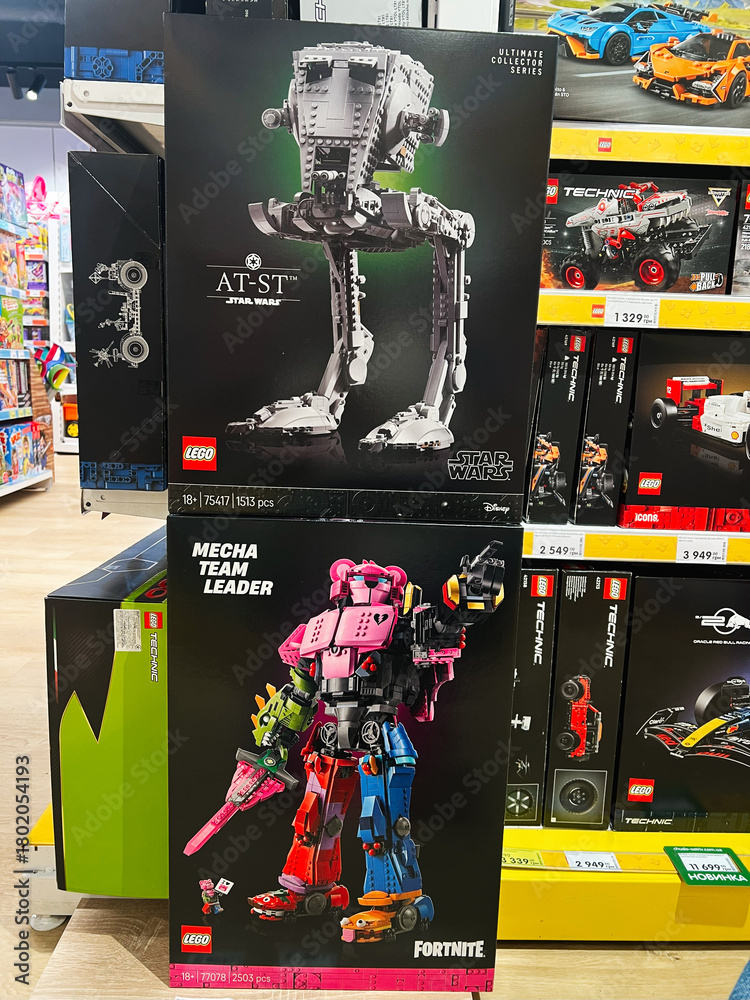 Naklejka premium Lego Star Wars AT ST and Fortnite Mecha Team Leader display on store shelf packaging