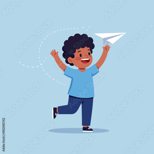 Boy joyfully plays with a paper airplane, expressing pure happiness and excitement in a playful scene 