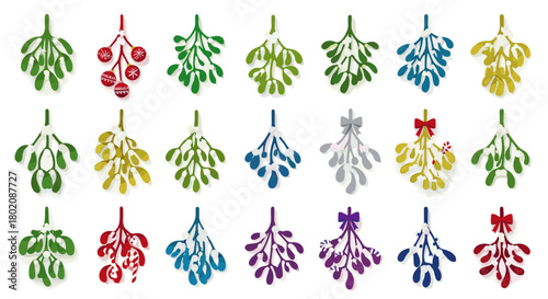 Collection of mistletoe sprigs with bows and berries isolated on